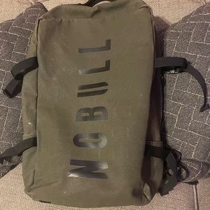 Lightweight- army style backpack. Side adjustment side straps.